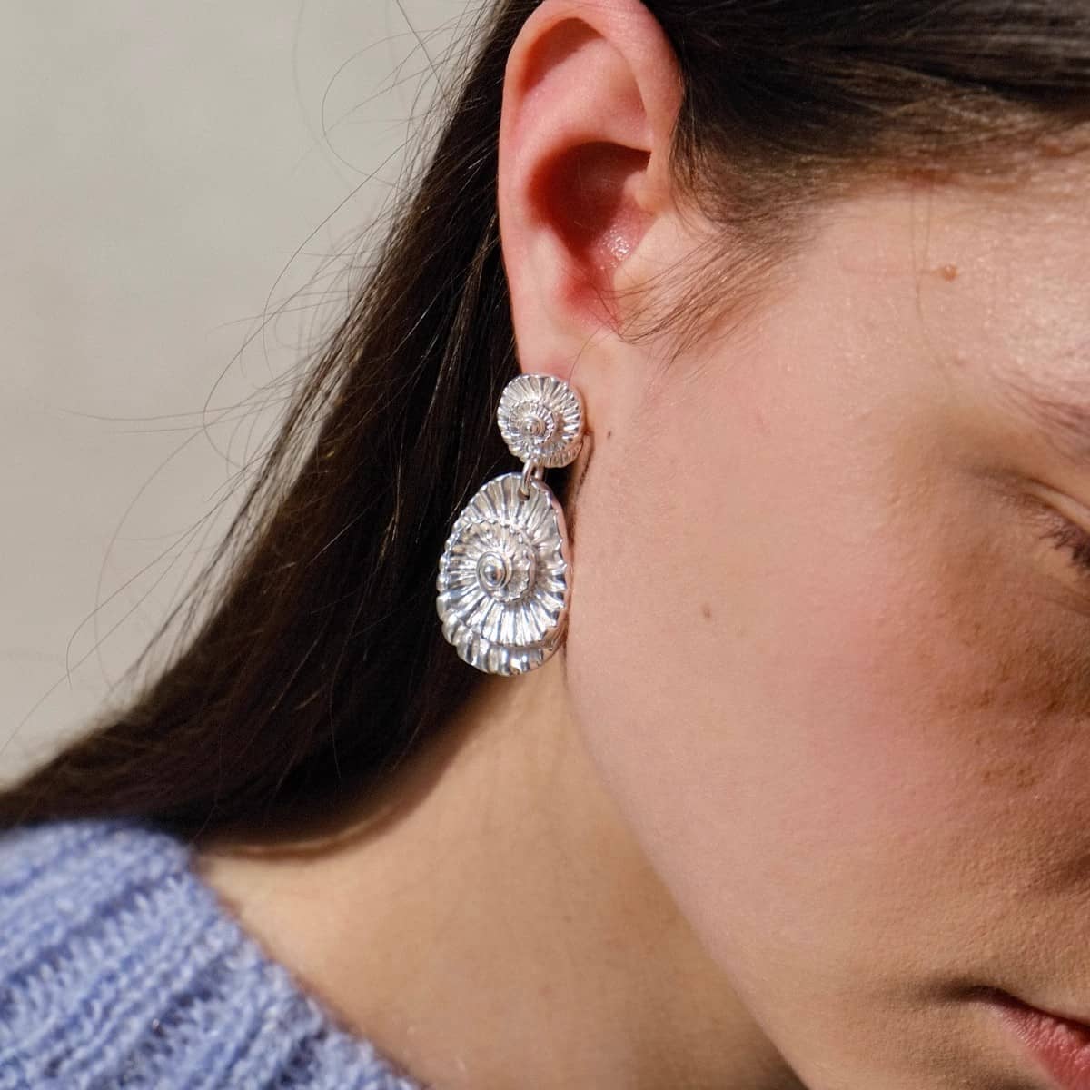 Shell fossil shaped earrings