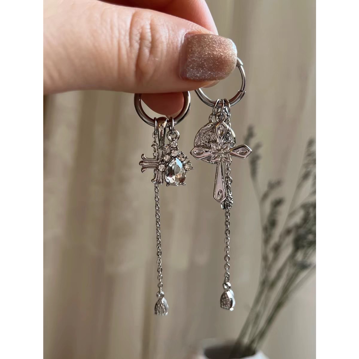 Cross tassel drops