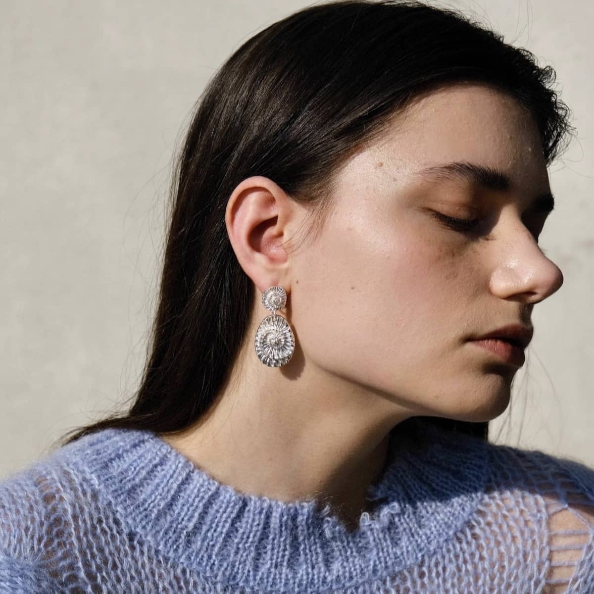 Shell fossil shaped earrings