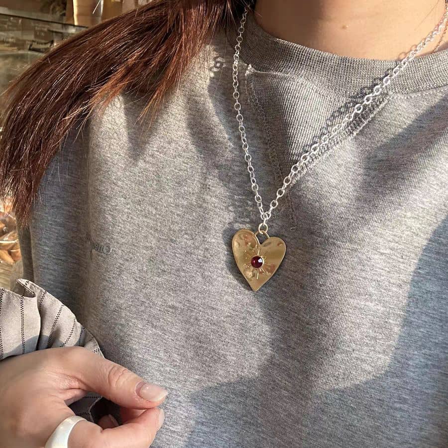 Heart Necklace with Radiant Sun Design
