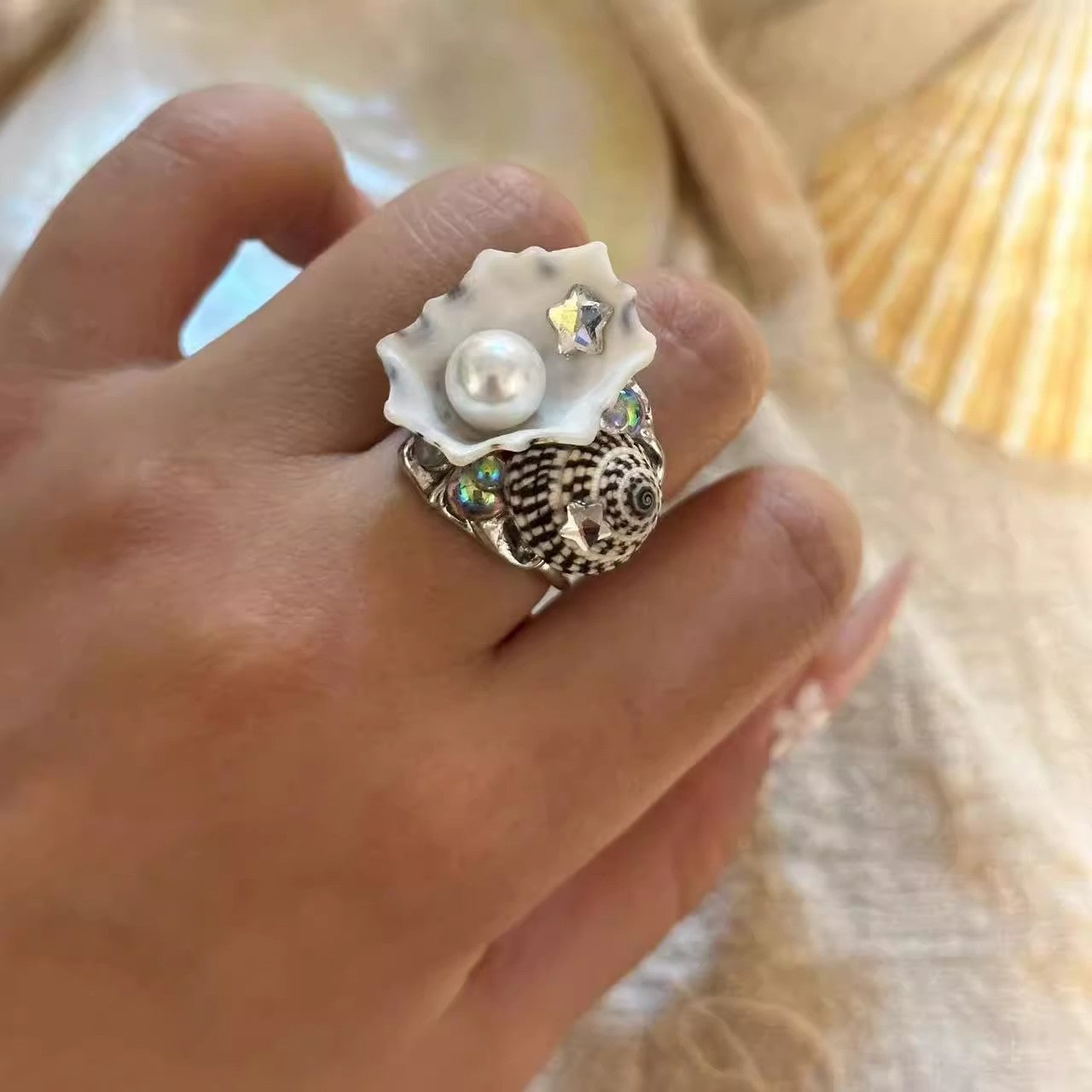 Adjustable seashell ring
