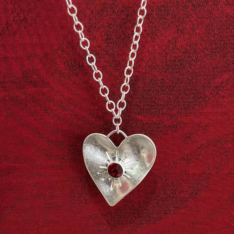 Heart Necklace with Radiant Sun Design