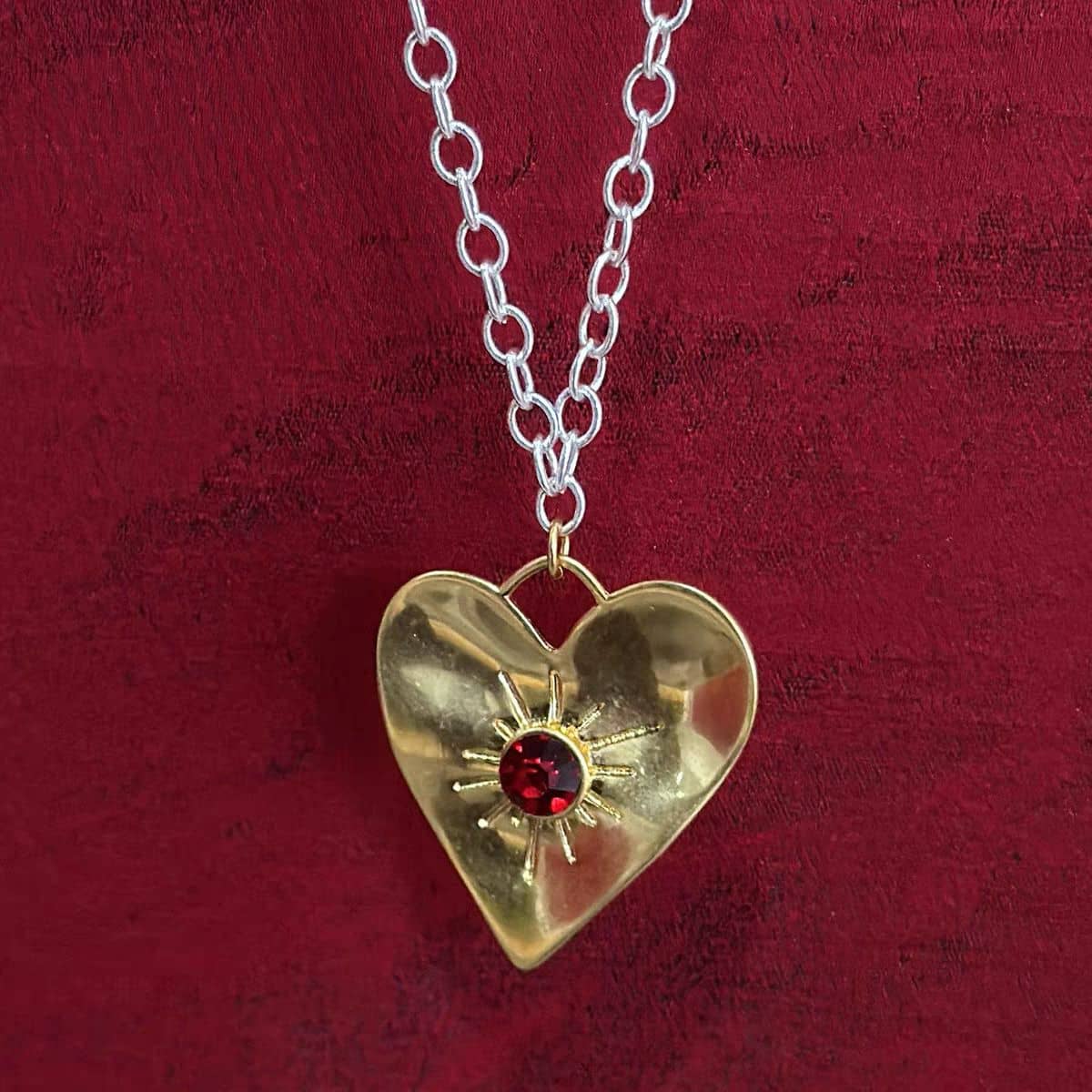 Heart Necklace with Radiant Sun Design
