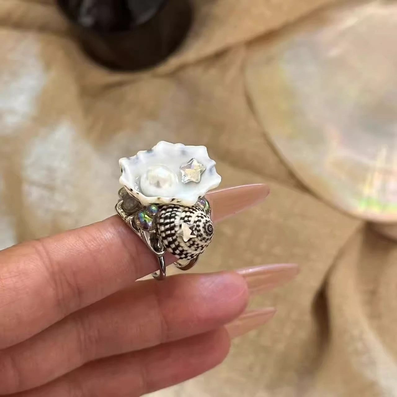 Adjustable seashell ring