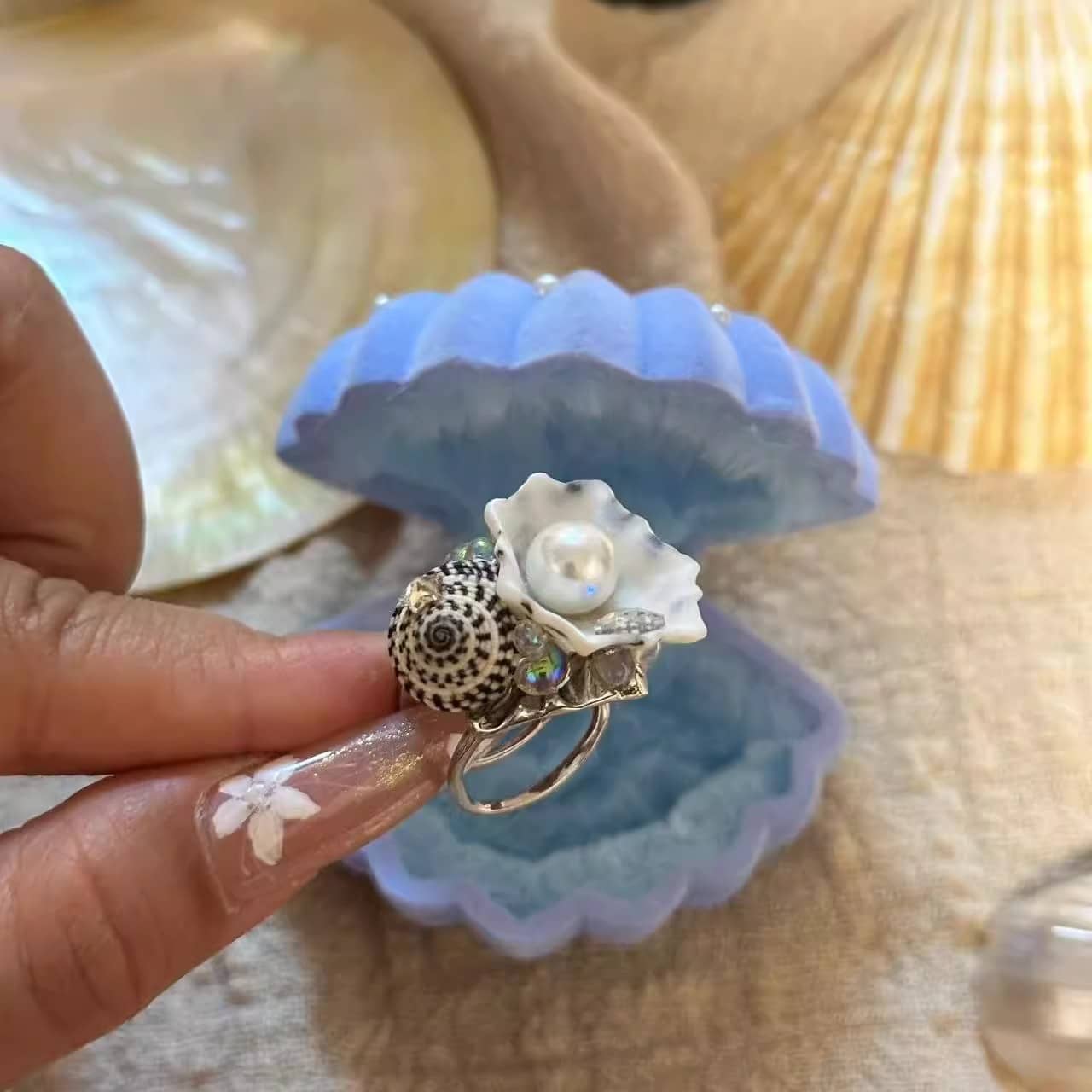 Adjustable seashell ring