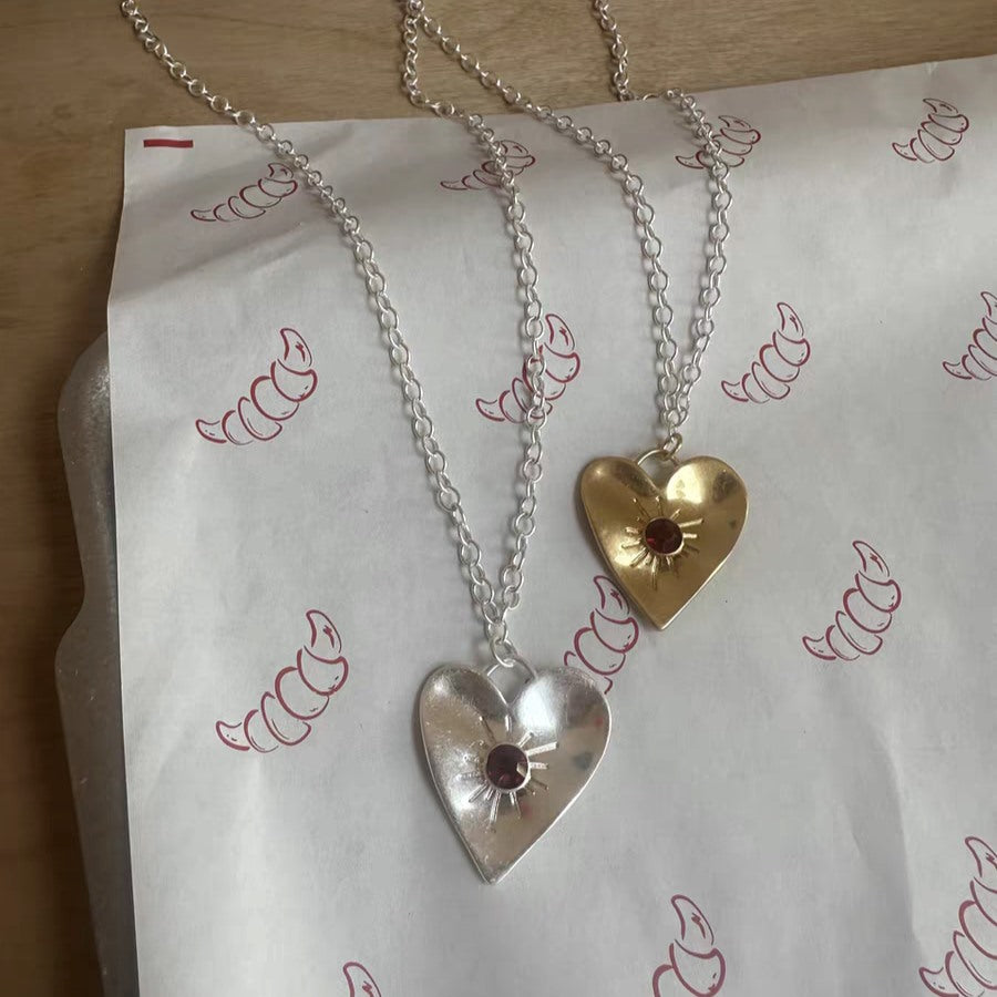 Heart Necklace with Radiant Sun Design