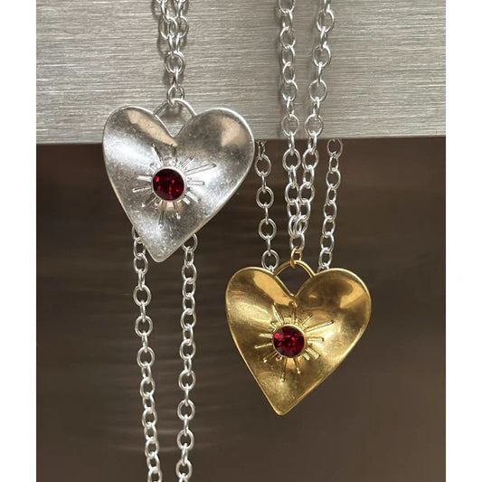 Heart Necklace with Radiant Sun Design